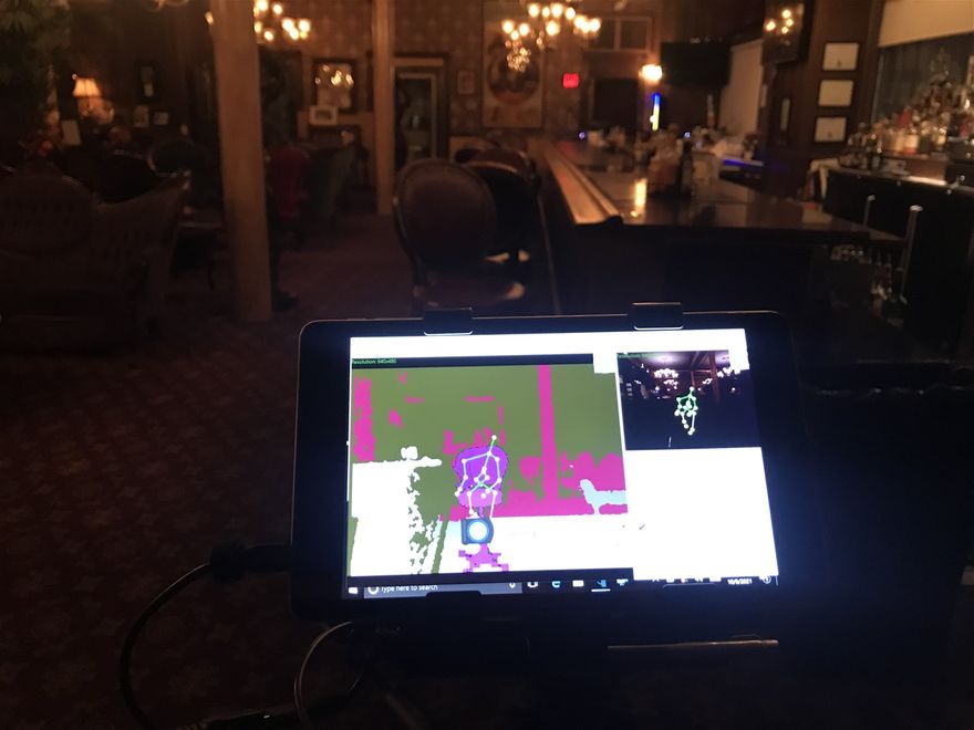 In this SLS capture of a spirit, there is a figure sitting in the chair. If it wasn't for the photo taken at the same time by a regular camera of the same exact area, we might have thought the camera was actually tracing the pattern of the chair, except in the regular photo there is no spirit figure. You will notice the barstool is empty in the background, but occupied in the SLS capture. INTERESTING!!!